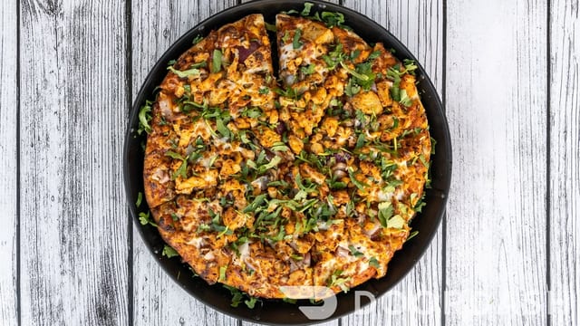 East Meets West Pizza (Chicken Tikka with Pepperoni).