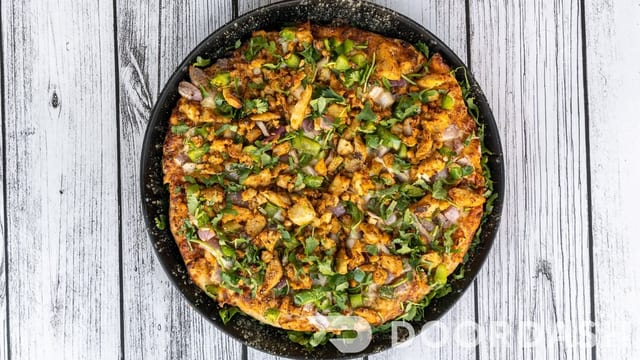 Butter Chicken Pizza.